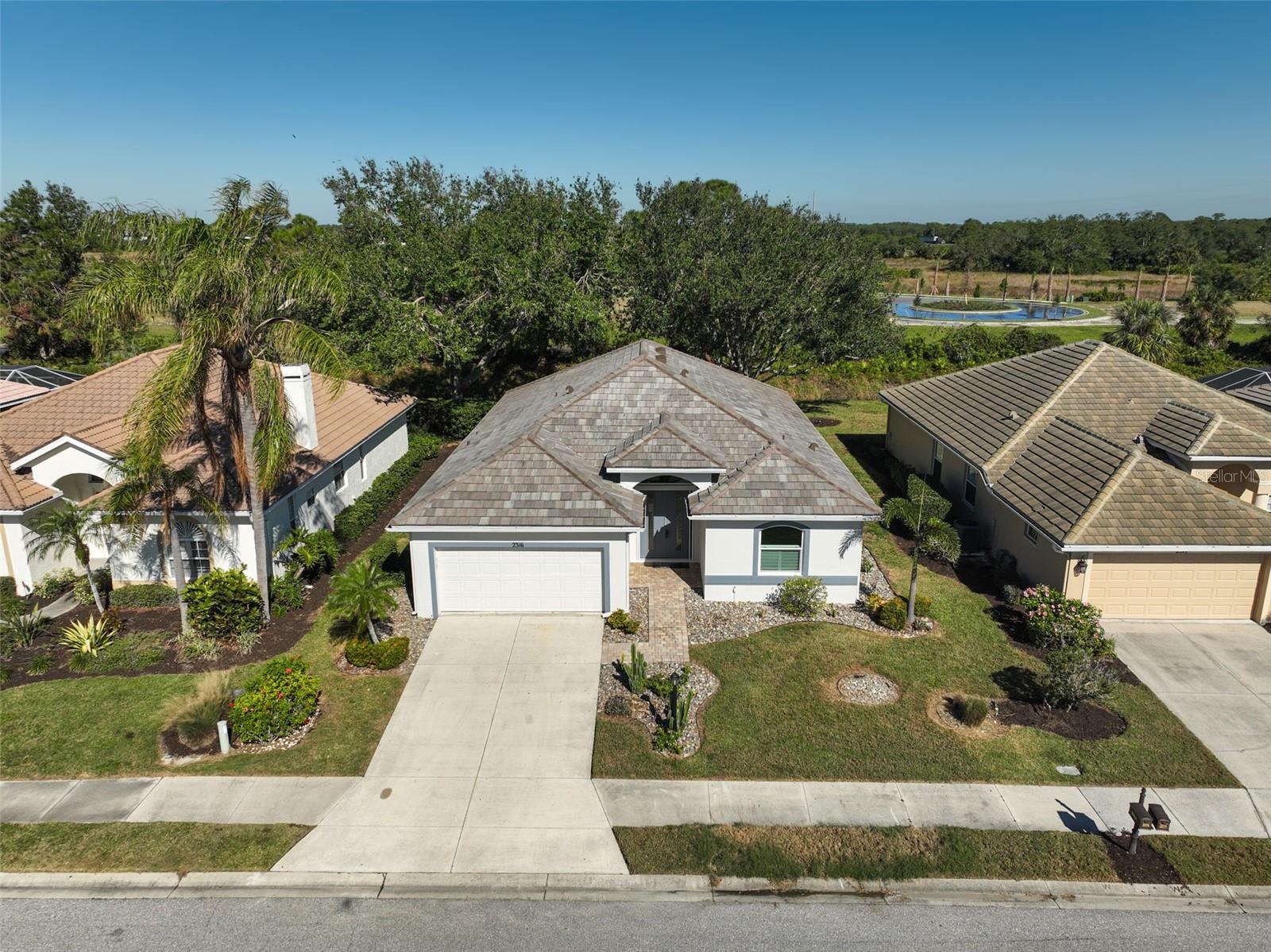 One or more photo(s) has been virtually staged. Hot off the press…a brand NEW ROOF installed November 2024! Impressive transformation of this amazing Calusa Lakes property. Completely renovated from head to toe…flowing luxury vinyl flooring, modern kitchen featuring stainless steel appliances, farm sink and quartz countertops coupled with an open design expanding over the main living area and new under air-conditioned space creates a large, desirable floorplan. This 2 bedroom, 2 bath homes features an additional den or office space with meticulous attention to detail. Crown molding, plantation shutters, freshly painted interior and impact windows and doors makes this the IDEAL home! Roof Certification plus Wind Mitigation are available for the new owner and no worries here with NEW AC in 2023. Numerous windows throughout the home create a bright and uplifting atmosphere also allowing you to enjoy the privacy of the backyard. Situated in the maintenance free section of Falcon Trace provides you with use of the heated, community pool within walking distance and lawn care included! Calusa Lakes is a desirable golf community where there is NO mandatory golf membership and No CDD fee. This hidden gem is nestled close to the new Sarasota Memorial Hospital, Nokomis Beach, Legacy Trail and the numerous boutique shops and restaurants on Venice Island. The additional residents only road provides quick access to Honore and Highway points north and south. Welcome to the lifestyle you deserve! BE SURE TO VIEW THE 3-D & AERIAL TOURS.