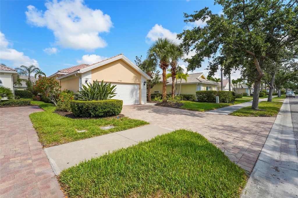 Photo of 7716 Uliva Way, Sarasota, FL 34238 (MLS # A4653238)