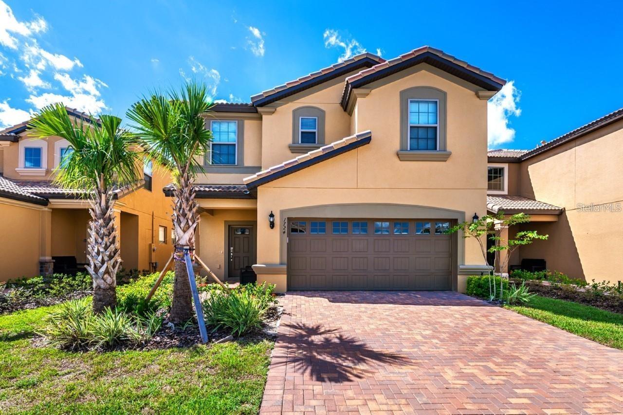 Luxurious 7-Bed, 5.5-Bath Retreat in Windsor at Westside! Nestled on a premium lot in the coveted Windsor at Westside gated community, this fully furnished 7-bedroom, 5.5-bathroom home is perfect for vacations, primary living, or investment, just minutes from Disney. Enjoy a spacious open floor plan with owner’s suites on both floors, a gourmet kitchen featuring stainless steel appliances, 42-inch dark wood cabinets, stone countertops, and a large breakfast bar. The living room seamlessly connects to a vast covered lanai and heated pool with a soothing spa, overlooking a serene conservation area, perfect for soaking up Florida’s sunshine and stunning sunsets. Residents gain access to resort-style amenities, including a clubhouse, heated pool, lazy river, water playground, fitness center, sports courts, games room, on-site store, restaurant, and bar.