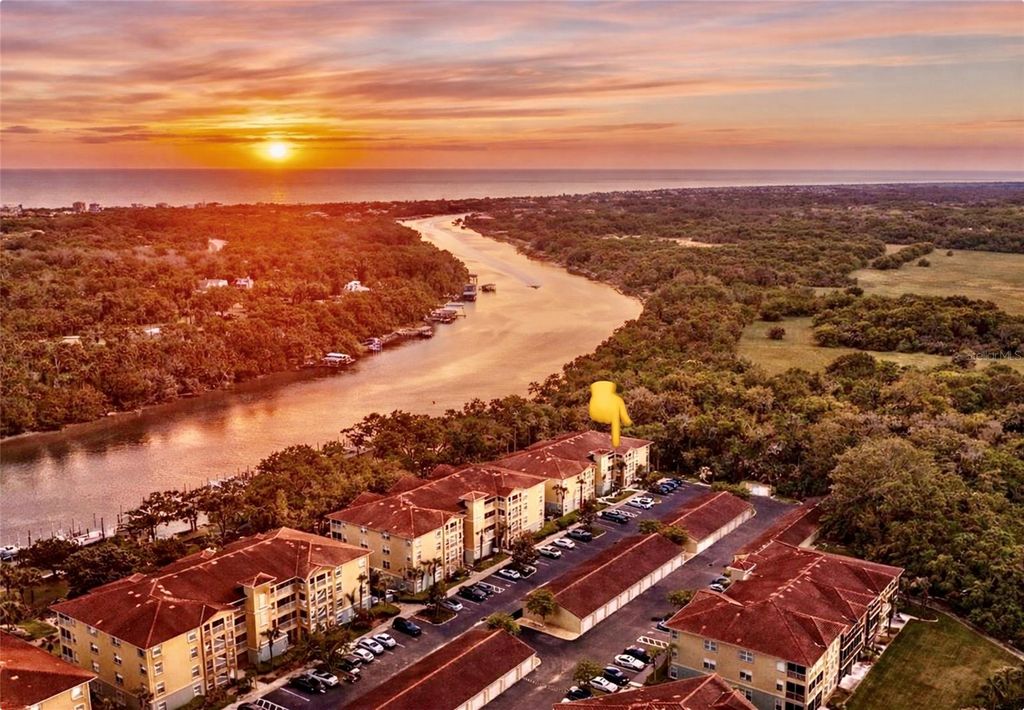 Photo of 100 Canopy Walk Lane #112, Palm Coast, FL 32137 (MLS # FC315611)