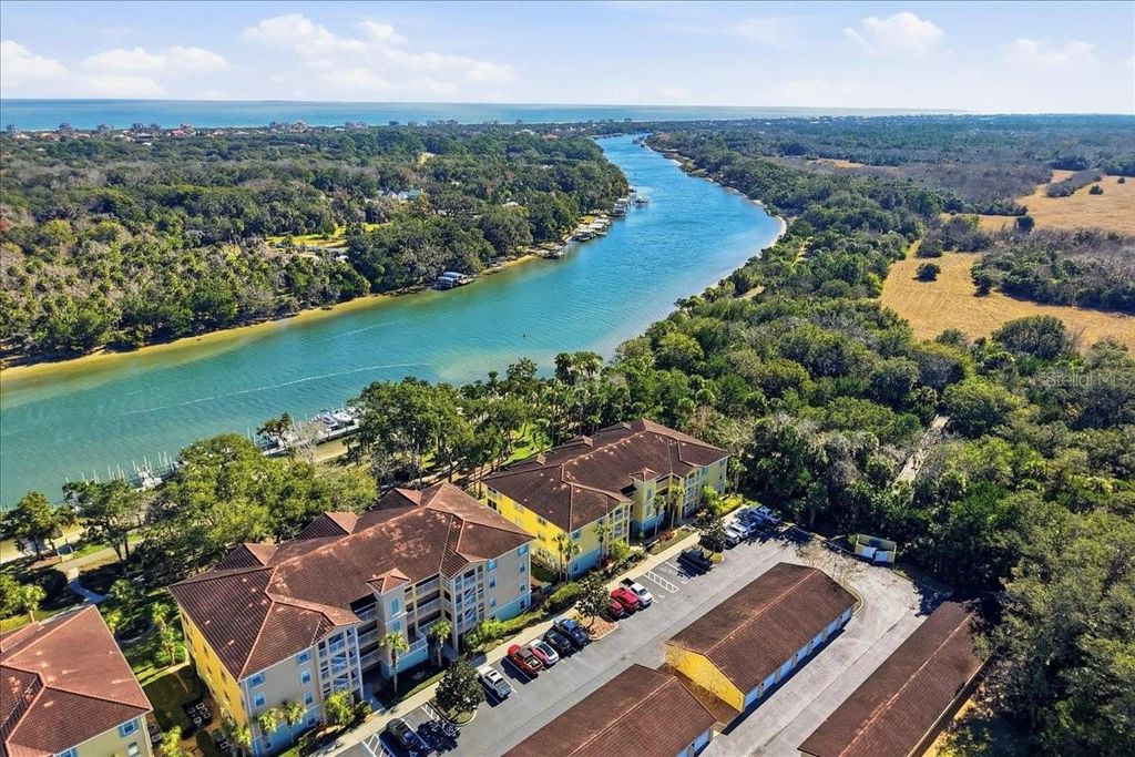 Photo of 100 Canopy Walk Lane #112, Palm Coast, FL 32137 (MLS # FC315611)