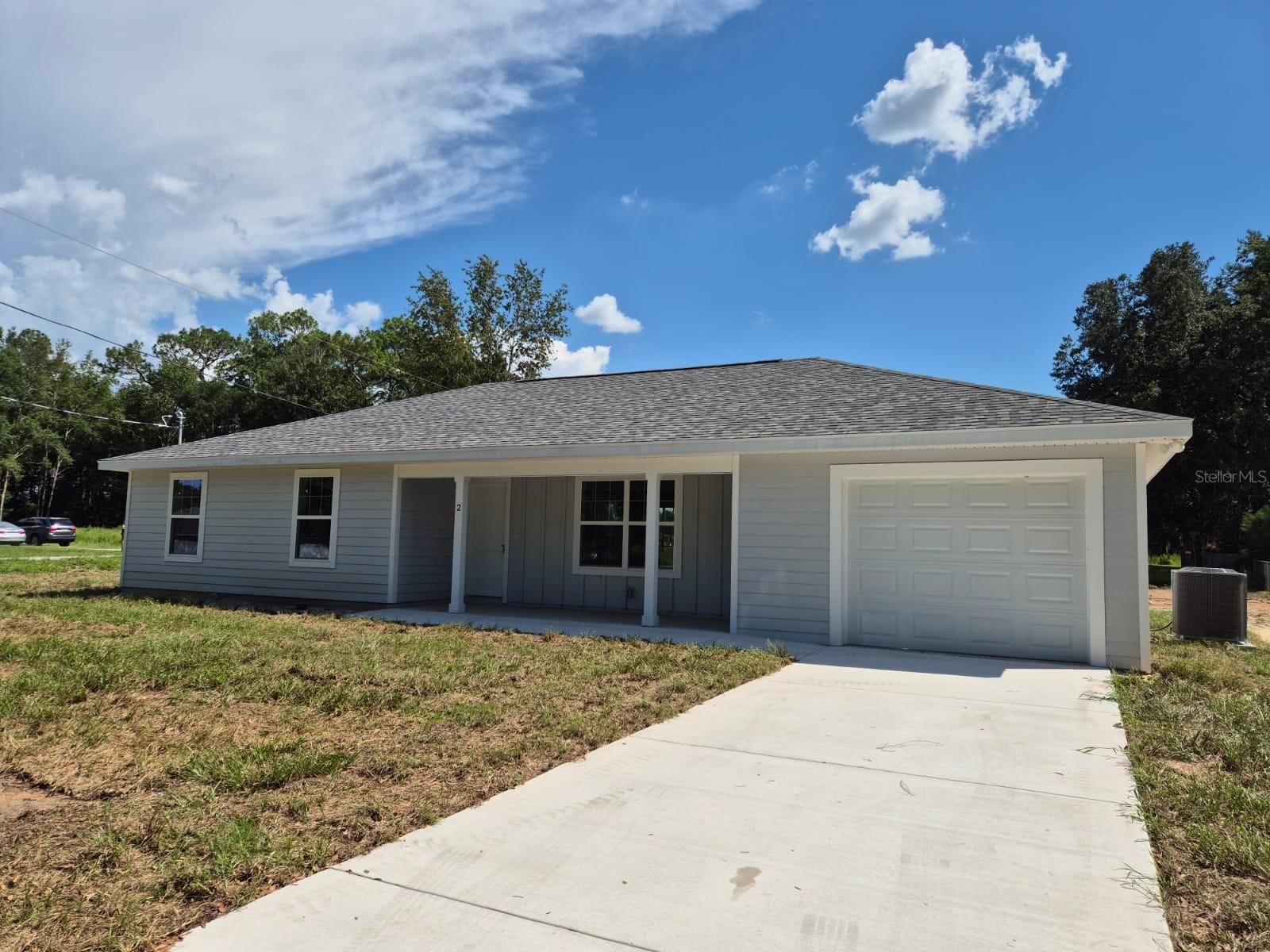 Under Construction. New Construction Home in Silver Springs Shores, FL – Corner Lot & Prime Location! Welcome to your dream home in Silver Springs Shores, Florida. This newly built residence sits on a spacious corner lot of over a quarter acre, offering added privacy, curb appeal, and room to expand. Featuring 3 spacious carpeted bedrooms, 2 full bathrooms with ceramic tile, and 1,342 sq ft of thoughtfully designed living space, this home combines comfort, space, and natural light. Step inside and enjoy high ceilings that amplify the open, airy feel. The modern kitchen is fully equipped with stainless steel appliances (stove, refrigerator, microwave, dishwasher), along with a granite kitchen isle, which can be used as a secondary dining table perfect for a family day. The laundry area is bright, well-ventilated, and includes a large storage closet. An attached garage and generous yard complete this perfect package. Located in a quiet, fast-growing neighborhood, this home offers proximity to well-established schools, banks, pharmacies, supermarkets, and medical centers — all with quick access to major roadways. You’re also just minutes away from Silver Springs State Park and the World Equestrian Center. • Peaceful location in a developing community Move-in ready! Your new home awaits – schedule your private showing today!