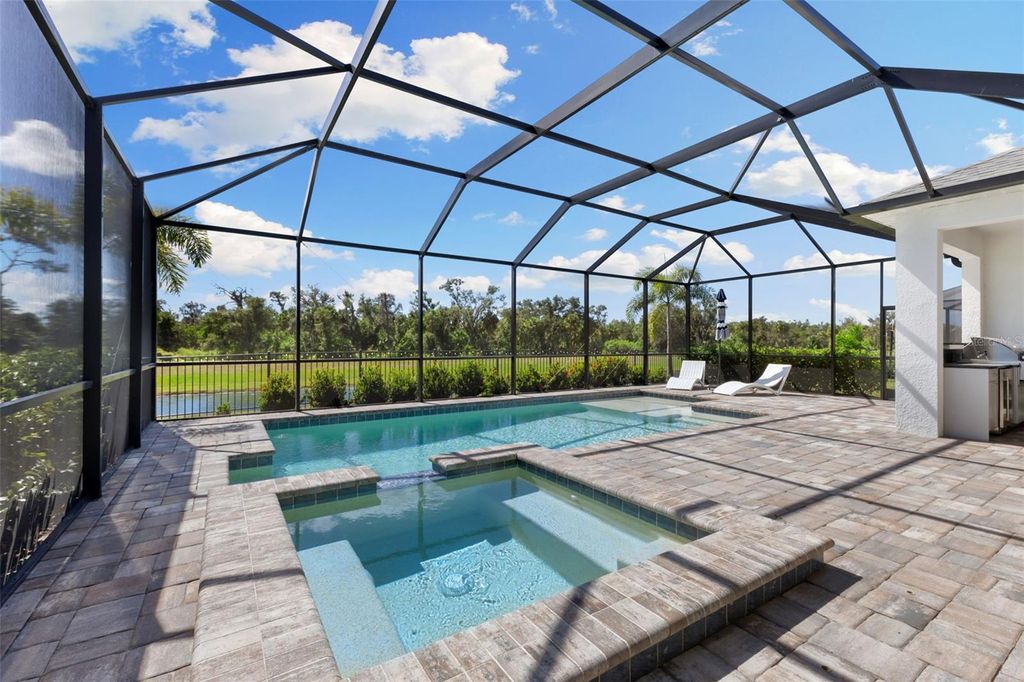 Photo of 14347 Skipping Stone Loop, Parrish, FL 34219 (MLS # A4669143)