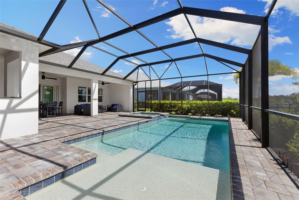 Photo of 14347 Skipping Stone Loop, Parrish, FL 34219 (MLS # A4669143)