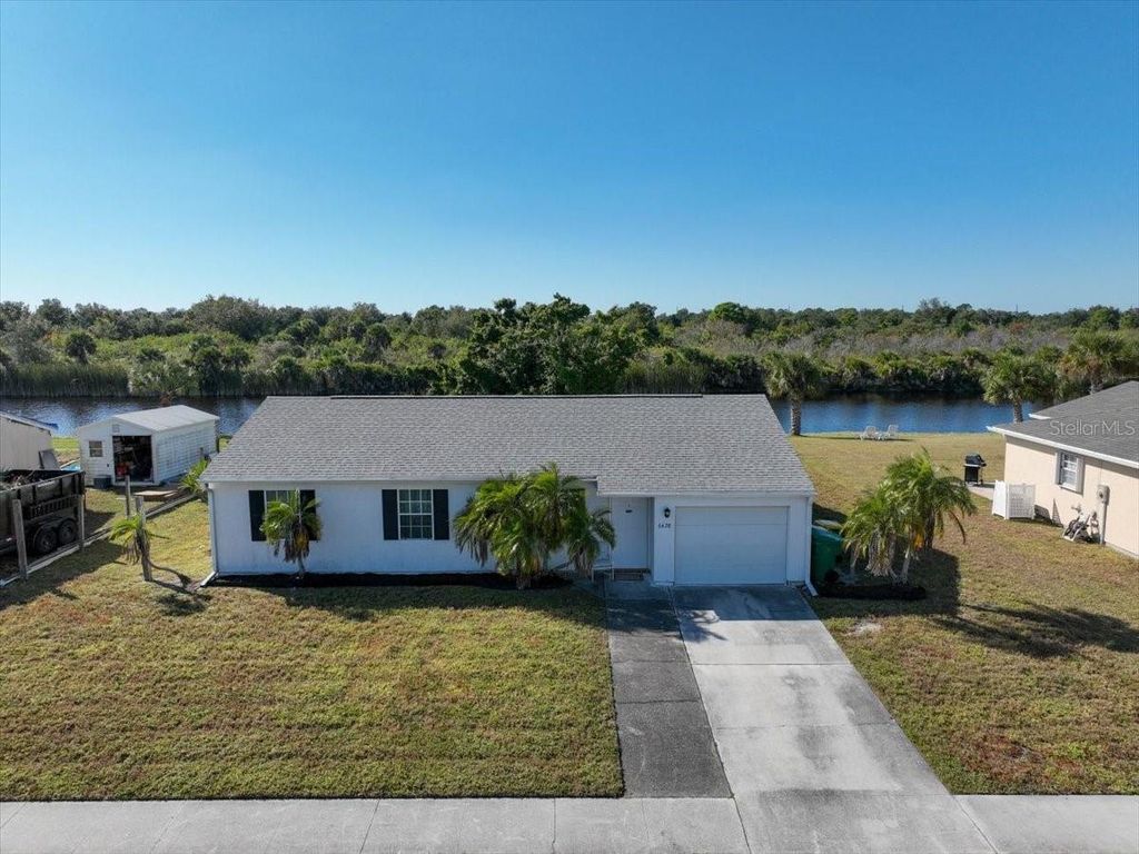 Photo of 6628 Thorman Road, Port Charlotte, FL 33981 (MLS # D6144823)