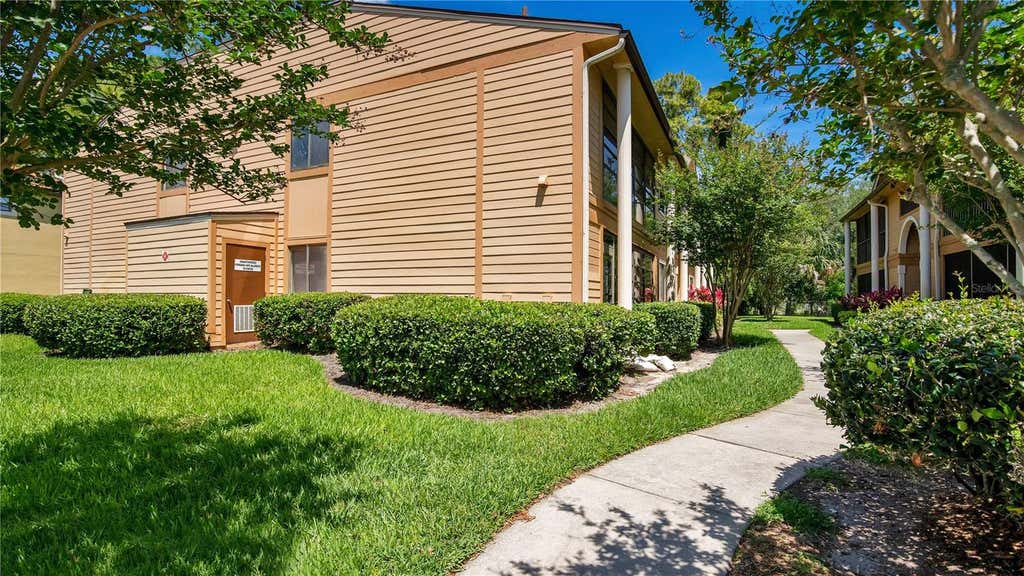 Photo of 6019 Scotchwood Glen #204, Orlando, FL 32822 (MLS # O6422984)