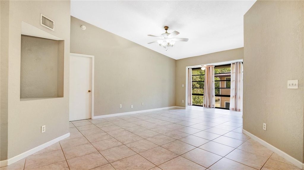Photo of 6019 Scotchwood Glen #204, Orlando, FL 32822 (MLS # O6422984)