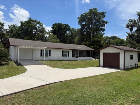 Photo of 1141 County Road 457, Lake Panasoffkee, FL 33538 (MLS # G5113351)