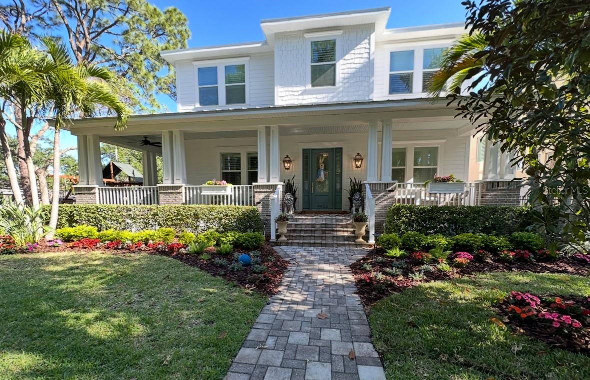 No detail was overlooked in this luxury custom built home. As you arrive you are greeted by a winding pavered walkway and mature
trees. The front porch wraps around and is an ideal outdoor dining retreat. Stepping into the home, you are welcomed by high
ceilings, crown molding, natural light and timeless architectural details that adorn the formal dining room and pocket french doors
opening into the study. The gourmet kitchen features an oversized island, cabinetry stacked to the ceiling with lighting and dentil
molding details, custom refrigerator paneling, gas stove with pot filler and butlers pantry. French doors lead out to the beautifully
landscaped fenced yard and above the garage is a guest suite currently used as an office, ideal for today’s environment of working
from home. Upstairs you will find the master bedroom which has tray ceilings and exquisite finishes in the bath as well as 3 other
generous sized rooms one with en suite as well as the laundry room.Located in the desirable Plant School District, in the South
Tampa community, this home sits on a beautiful corner lot and certainly will not disappoint. View the 3D Virtual Reality walk through
by clicking the virtual tour link.