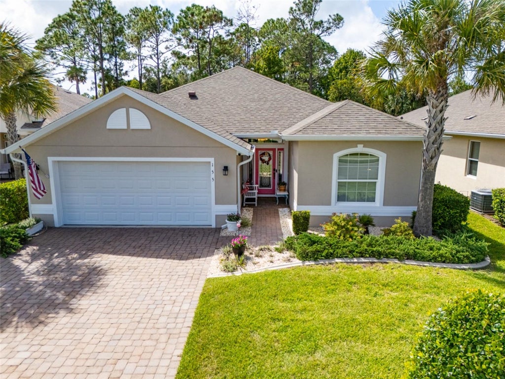 Photo of 155 Park Place Circle, Palm Coast, FL 32164 (MLS # FC321613)
