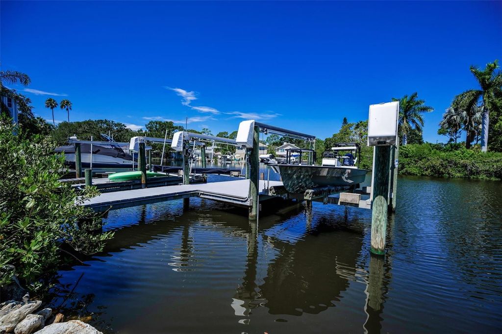 Photo of 602 Mccosh Avenue, Crystal Beach, FL 34681 (MLS # TB8421062)