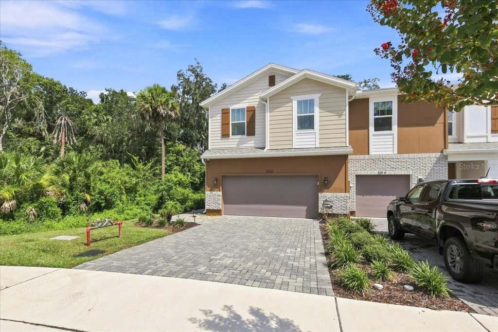 Photo of 590 Southern Edge Way, Sanford, FL 32771 (MLS # O6435710)