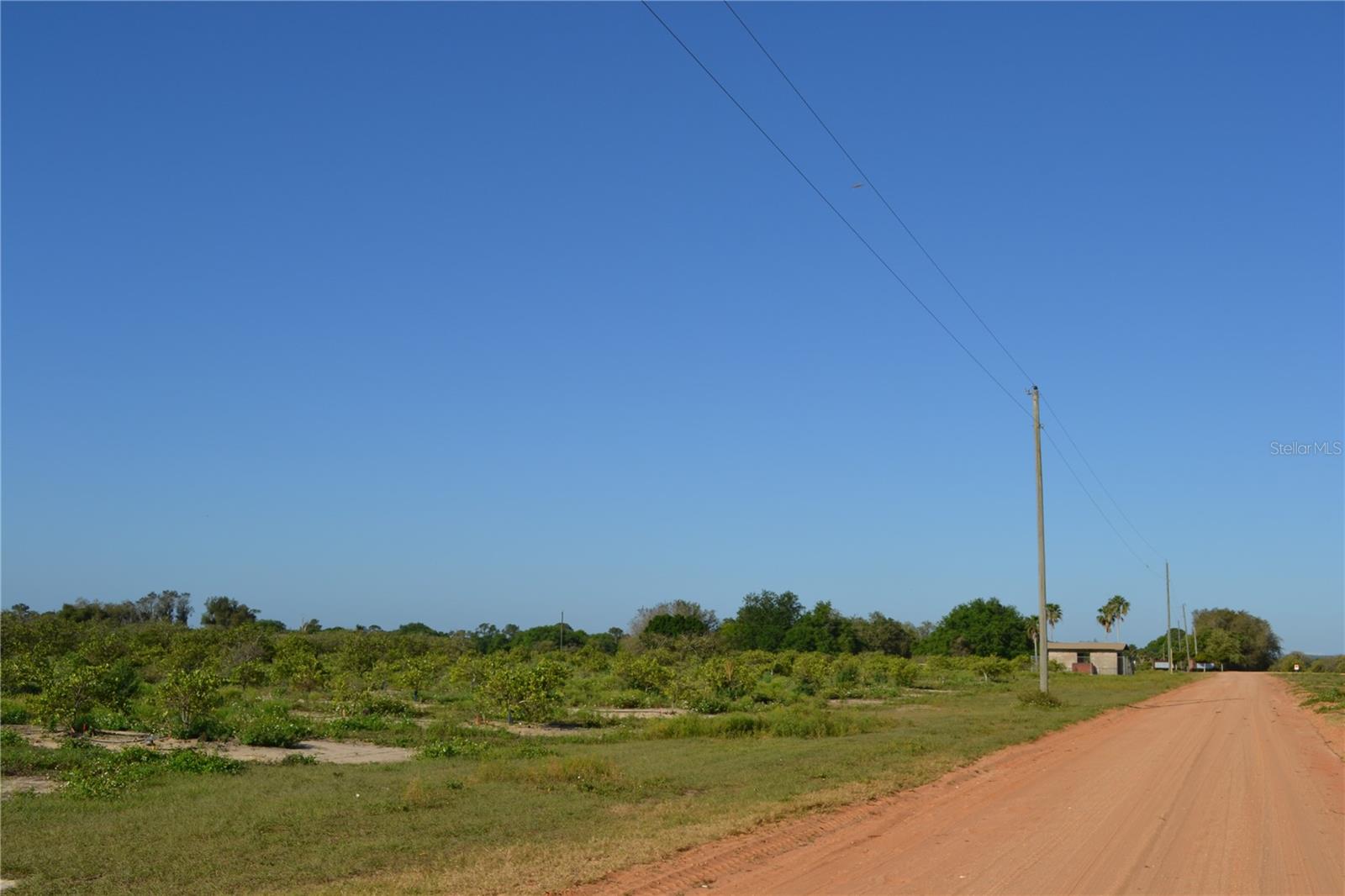 This expansive citrus grove features a well-maintained pump house over 20± acres situated in the esteemed Lake Wales area. This property offers an exceptional opportunity for land and residential investors to capitalize on a historic citrus community. The vast grove presents the potential for lucrative agricultural ventures, complemented by the convenient location and high visibility. With its prime location and flourishing grove, this property is a compelling investment prospect for those seeking to enter or expand within the citrus market or transition into residential development.
Citrus grove in the esteemed Lake Wales area
Well-maintained pump house supports agricultural operations
Prime opportunity for citrus investment or residential development
Nestled in the idyllic surroundings of Lake Wales, this area is renowned for its natural beauty and abundant recreational opportunities. The nearby historic Bok Tower Gardens offers a serene retreat amidst lush landscapes and captivating architecture, while the picturesque Lake Kissimmee State Park beckons outdoor enthusiasts with its pristine wilderness and diverse wildlife. Residents and investors alike can indulge in the rich cultural scene of Lake Wales, with its charming downtown area boasting local boutiques and eateries. This thriving community presents an ideal setting for those seeking a harmonious blend of nature, culture, and leisure, making it a desirable location for land and residential investment.
One of the owners is a State of Florida Licensed Real Estate Broker Associate.