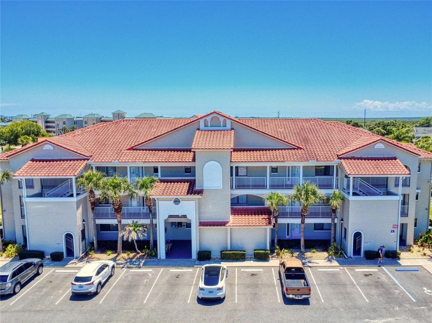 Live on an island within an island community in this beautifully updated 2-bedroom, 2-bath condo in Bouchelle Island. This move-in-ready residence features a renovated kitchen and updated bathrooms with stylish finishes throughout.

Enjoy peaceful garden views from the large screened terrace, creating the perfect setting for relaxing mornings or quiet evenings. Light-filled and welcoming, this model-like condo offers fresh, clean, pristine interiors with beautiful, relaxing décor designed for comfortable coastal living.

Furniture is negotiable, making this an easy transition to your island lifestyle.  Located in the sought-after Bouchelle Island community, residents enjoy resort-style amenities including two pools, a spa tub, a scenic half-mile Intracoastal walkway, a clubhouse, fitness room, and a tiki hut gathering area. Water lovers will appreciate the private boat launch, floating dock, and availability of dry and wet slips, as well as kayak storage (check waiting list). Stay active with tennis and pickleball courts, and practice your swing on the 18-hole chip and putt course. This is a rare opportunity to experience peaceful, island-style living in a vibrant community—where every day feels like a vacation.
Bouchelle Island is minutes away to our beautiful Atlantic Ocean, local restaurants, unique shops, art galleries, parks, groceries stores, hospitals, I-95 and so much more for you to discover!