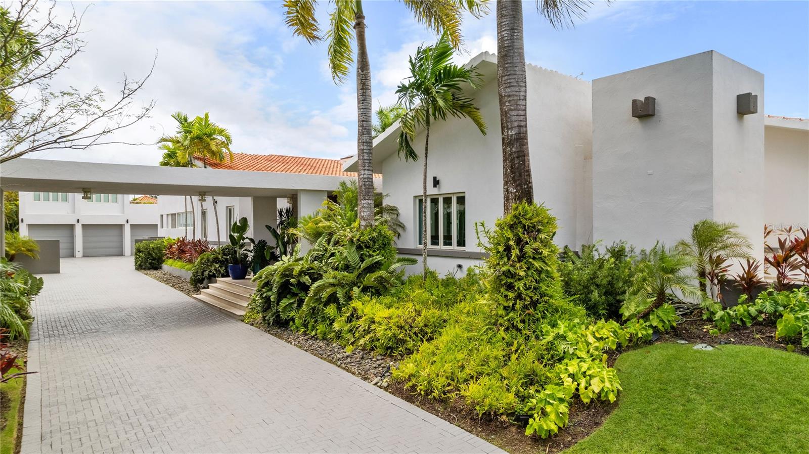 Discover unparalleled luxury in this exclusive Dorado Beach East residence, one of only two unique models in the community. This extraordinary property features 6 bedrooms and 6 bathrooms, ensuring ample space and privacy for the whole family. With 4,800 square feet of interior living space and a total construction area of 8,754 square feet, this home offers an expansive and open floor-plan that maximizes comfort and elegance. Bathed in natural light, the interior exudes a Hamptons feel, combining coastal charm with elegant design. Enjoy the grandeur of high ceilings that enhance the airy and open feel of the living areas. The property boasts a generously sized driveway capable of accommodating over 15 cars, in addition to a 3-car garage with space for a golf cart. One of the 6 bedrooms is a casita, complete with its own full bathroom, perfect for guests or extended family. Situated on a 2,252 square meter lot, this home provides plenty of outdoor space for recreation and relaxation. Nestled in the Dorado Beach East community, this property offers the perfect blend of luxury, privacy, and convenience. Experience the epitome of upscale living in this rare and extraordinary Dorado Beach East home. Don't miss the opportunity to own a piece of paradise in one of the most sought-after communities.