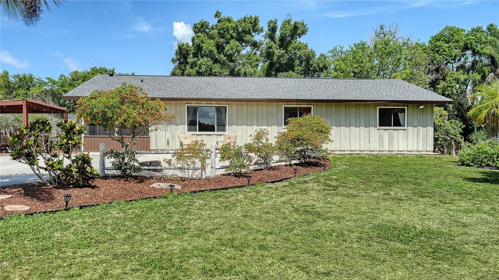 Photo of 4842 Nutmeg Avenue, Sarasota, FL 34231 (MLS # A4710437)