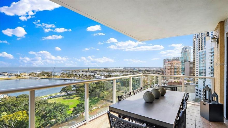 PANORAMIC WATER & CITY VIEWS • RARE SE CORNER • 3,306 SF • LUXURY DOWNTOWN LIVING

Professional Photos Coming Soon

A seldom-available opportunity to own one of the most coveted luxury condominiums in downtown St. Petersburg, offering 3,306 heated square feet of expansive, single-level living that truly lives like a private residence.

This rare Southeast corner Dominica floor plan has not been available above the 5th floor in over five years, underscoring the exceptional nature of this offering.

Enter through a private foyer with double doors into breathtaking, unobstructed 180-degree panoramic views of Albert Whitted Airport, St. Pete Marina & Pier, Vinoy Yacht Basin, the St. Pete Pier, North Straub Park, Tampa skyline, and southern bay vistas.

Filled with natural light, this beautifully designed residence features high ceilings, crown molding, custom built-ins, electronic shades, and elegant tile and solid cherry wood flooring throughout—no carpet.

The open-concept layout seamlessly connects the kitchen, dining, and living areas, making it ideal for both daily living and upscale entertaining.

The chef’s kitchen is appointed with custom granite countertops and island, maple cabinetry, and premium GE Profile stainless appliances, including a built-in wine cooler, warming drawer, and four ovens—perfect for culinary enthusiasts and hosting.

Additional features include:

• Separate air-conditioned storage unit
• Dedicated laundry room
• Two premium side-by-side deeded covered parking spaces in secure garage
• Private residence entry

The special assessment has already been paid by the seller, covering the upcoming luxury resort-style 4th-floor pool and amenity transformation, allowing the new owner to immediately enjoy the enhanced lifestyle.

3 Bedrooms | 3.5 Baths | 3,306 Heated SF | Den/Study (currently a wine room)

Surrounded by world-class dining, shopping, waterfront parks, the Pier, marina, and vibrant arts scene, this residence offers walkable downtown living with resort-style comfort.

A rare combination of scale, corner exposure, panoramic views, premier location, secure parking, and timeless finishes—this is truly luxury urban waterfront living at its finest.