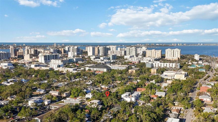 Rare Investment Opportunity in Downtown Sarasota’s Redevelopment Wave!

Four contiguous lots across two parcels totaling approximately 0.44 acres (1721 & 1743 8th Street) — right in the heart of one of downtown Sarasota’s most exciting transformation zones. This restored vintage home sits in a rapidly evolving neighborhood becoming one of the city’s most desirable addresses.

Just steps from the beloved 10-acre Gillespie Park, featuring grand oaks, tennis and basketball courts, a scenic pond, dog park, fitness trail, and walking paths. Enjoy walking distance to Main Street, with its premier shops, galleries, and restaurants, and only 0.7 miles to Sarasota’s waterfront and The Bay, the city’s new 53-acre signature park.

This property lies within an Opportunity Zone with no HOA and no deed restrictions, offering exceptional flexibility for investors and developers. Close to the downtown business district and minutes from the Westcoast Black Theatre Troupe, you’re surrounded by Sarasota’s vibrant cultural and commercial scene.

Prime Development Potential:
Build 4–6 residential units in this rapidly appreciating neighborhood where new projects are transforming the landscape. Perfect for townhomes, multi-family residences, or custom urban homes. The location offers everything today’s buyers want—walkability, green space, and access to downtown and the bayfront.

Investment Strategies:
Buy and hold: Rent the charming existing 2-bed, 2-bath home for steady income while land values continue to rise in this high-demand area.
Develop now: Join the wave of new construction reshaping the district and capitalize on downtown’s growth.
Value-add opportunity: Position yourself in the path of progress where new developments are achieving premium returns.

Residents enjoy unparalleled walkability to downtown Sarasota’s dining, arts, and entertainment, including the Van Wezel Performing Arts Hall, Sarasota Orchestra, Marie Selby Botanical Gardens, and the Bayfront Marina.

This is more than a property—it’s a rare opportunity to be part of downtown Sarasota’s most dynamic transformation. Don’t miss this exceptional find in the heart of the city’s redevelopment boom!