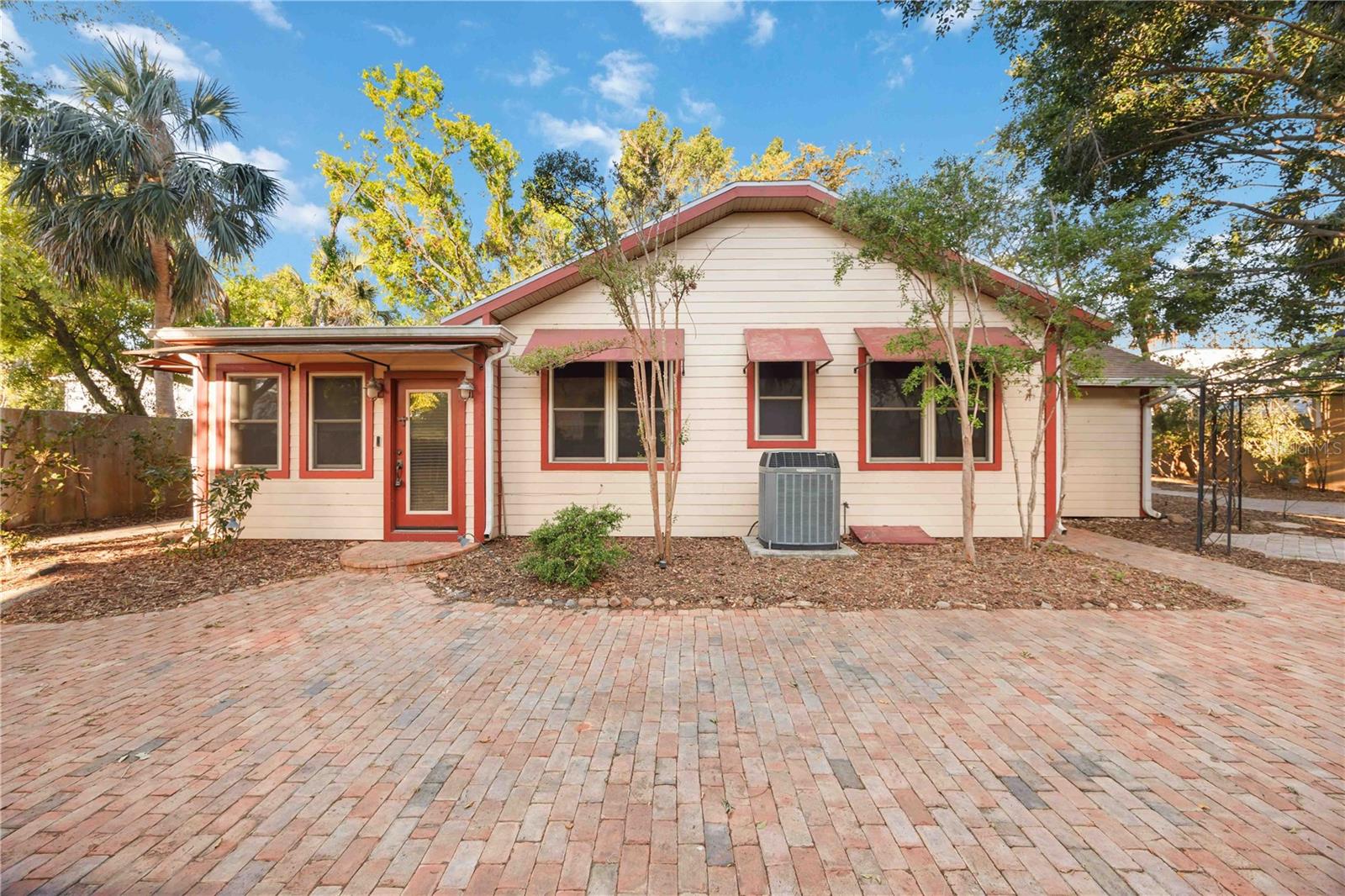 Rare opportunity in the Downtown Neighborhood District—4 contiguous lots across two parcels totaling approx. 0.44 acres (1721 & 1743 8th St). Located just one block from Gillespie Park and less than a mile to Downtown Sarasota, this property sits within an Opportunity Zone with no HOA or deed restrictions. The existing 2 bed, 2 bath home offers charm and potential. Ideal for redevelopment—townhomes, multi-family, or a custom urban retreat. Walk to shops, dining, Bayfront Park, and Sarasota’s cultural district. A rare find with green space and downtown access right outside your door.