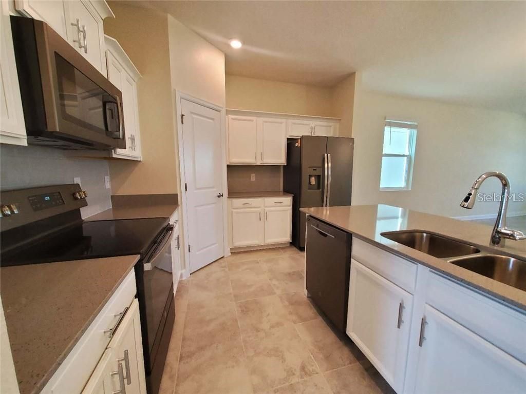 Photo of 13047 Inkwell Ave, Winter Garden, FL 34787 (MLS # O6405507)