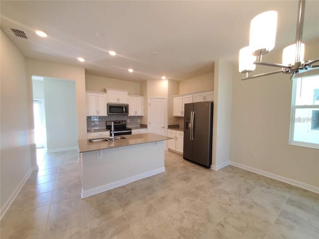 Photo of 13047 Inkwell Ave, Winter Garden, FL 34787 (MLS # O6405507)