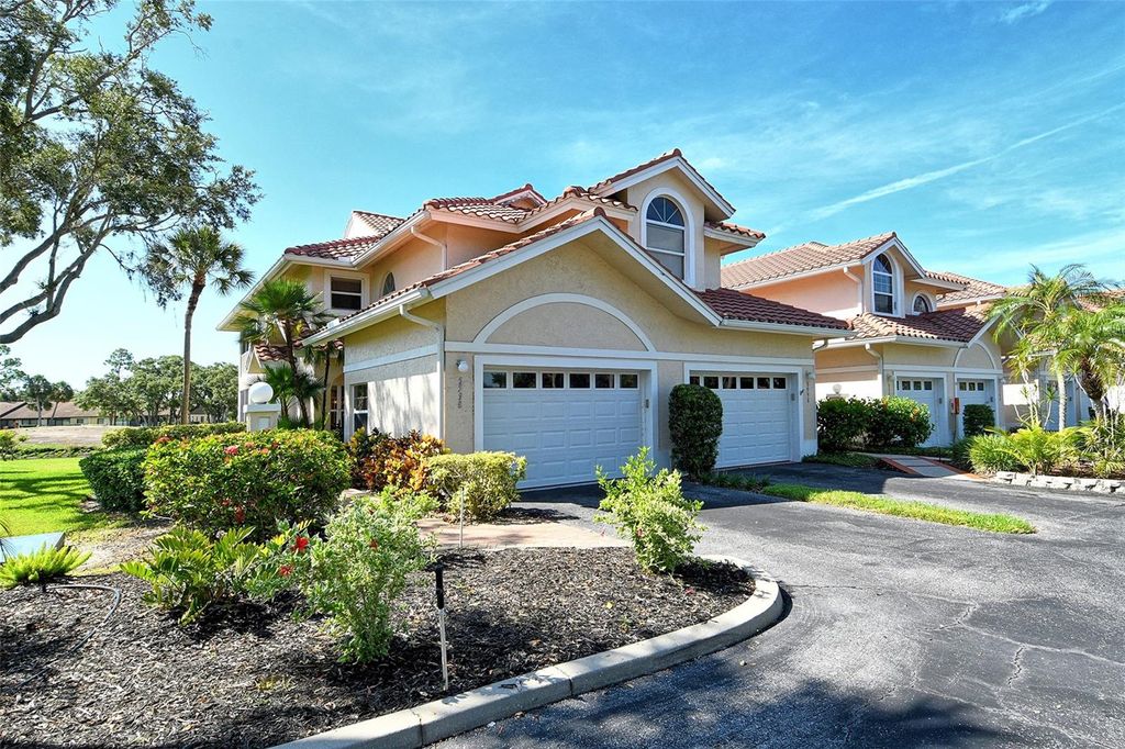 Photo of 5598 Golf Pointe Drive #unit A-1, Sarasota, FL 34243 (MLS # A4657753)