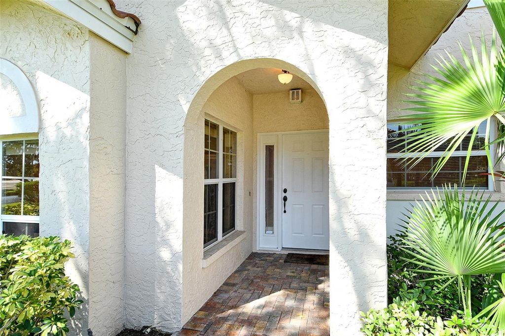Photo of 5598 Golf Pointe Drive #unit A-1, Sarasota, FL 34243 (MLS # A4657753)