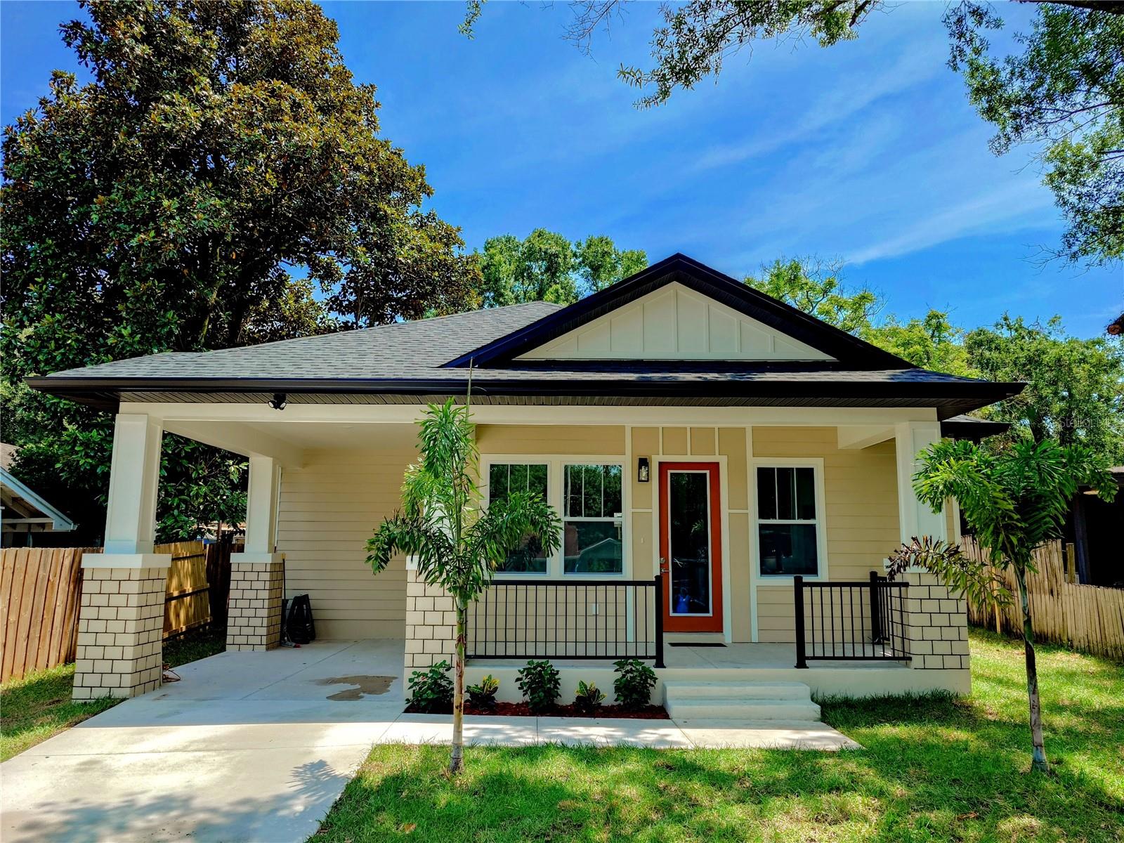 NEW CONSTRUCTION! OLD SEMINOLE HEIGHTS -URBAN LIFESTYLE. Experience the charm of Urban living in this meticulously crafted new construction Craftsman-style bungalow, nestled in the trendy Old Seminole Heights neighborhood, just moments from Downtown Tampa, Channelside, and the vibrant Riverwalk. This exceptional home is ideally located near the Hillsborough River, offering you convenient access to premier shopping, dining, and easy interstate connections. Discover the hidden gem of Patterson Street Park at the end of your street, a perfect spot for relaxing and enjoying a picnic amidst scenic nature. As you approach the home, a delightful front porch welcomes you, setting the tone for this stunning residence that boasts four bedrooms and two full bathrooms, with elegant luxury vinyl plank and tile flooring throughout. The thoughtful split floor plan ensures privacy and practicality, featuring three guest bedrooms at the front and a secluded owner’s suite at the rear. The heart of the home, the kitchen, is equipped with quartz countertops, built in cabinets, stainless steel appliances, ample storage, and a charming oversized island area with cabinets on both side, all complemented. The Primary suite offers generous space for a King bed, a large walk in closet for her, a separate closet for him, tray ceiling and beautiful ensuite bathroom with a curbless shower and dual vanity. Natural light floods the family room through sliding glass door that opens to a cozy covered porch in the spacious backyard. This area is perfect for entertaining and enjoying those warm summer days. Additional features include inside laundry room with a tankless electric water heater, a walkable attic for extra storage, 10 foot ceilings with level 4 smooth walls, rain gutters with leaf guard, underground drainage and hurricane impact windows. The house comes with a 2-10 home Buyers structural Warranty for buyer's convenience. Don’t miss the opportunity to make this craftsman bungalow your own and immerse yourself in the lifestyle of one of Tampa’s most sought-after neighborhoods. Located steps away from Patterson Street Park, walking distance to McDugald volleyball park, just a short ride away from the 22nd Street Disc golf park, Rogers Park golf course, and Rowlet Park with numerous activities. You'll find local favorite spots like Corner Club, Heights Pizza, Trip's Diner, C House, Front Porch and many more. This home is not just a place to live—it's a gateway to a vibrant urban lifestyle.