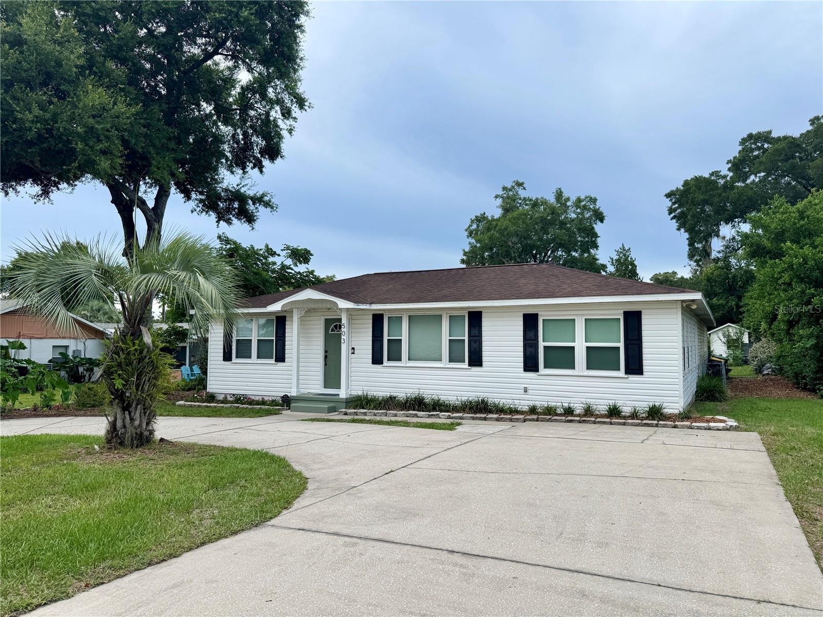 Looking for space, updates, and a great location? This 5-bedroom, 2-bath home has you covered. With nearly 2,000 square feet of living space and a fully fenced yard filled with 15+ fruit trees, there’s room to stretch out and enjoy the Florida lifestyle. Built for comfort and updated for peace of mind, the home features a new water heater (2022), some new windows (2023), new AC (2020), updated ductwork (2020 & 2021), and added insulation in the attic and crawlspace for energy efficiency. Inside, you’ll love the new kitchen updates (2025) including quartz countertops, new flooring, and a new back door. Best of all, you’re just a short drive (or bike ride!) from the restaurants, shops, and charm of downtown DeLand. Whether you’re looking for a big family home, room for guests, or a place to grow into, this one’s got great bones, tons of updates, and plenty of character. Call to schedule your showing today! *All info to be verified by buyer*