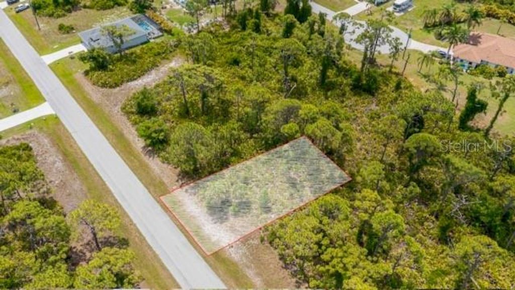 Photo of 105 Glades Drive, Rotonda West, FL 33947 (MLS # A4694915)