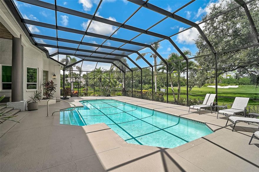 **BRILLIANTLY DESIGNED AND RENOVATED, CUSTOM GOLF COURSE ESTATE with SPECTACULAR WATER and GOLF COURSE VIEWS** is situated on the 8TH Green complex of the Interior HERON GOLF COURSE and is located on a tranquil, 0.59 Acre cul-de-sac lot behind the Secure Gates of The Oaks Country Club neighborhood. Featuring 4 Bedrooms PLUS Large Study/Den, 3 Full and 1 Half Baths, this Open Floorplan with Soaring Ceilings, Custom Built-Ins, Crown Moldings, Engineered Hardwood flooring and discerning architectural details throughout is ideal for entertaining both inside and out! The Impressive NEW Kitchen features Quartz Counters, Premium Stainless Steel appliances including Wolf and Subzero brands, and Large Island with seating area. The Expansive Primary Bedroom Suite entails a Bonus sitting area, multiple walk-in closets with custom built-ins and spacious bath with dual vanities, custom-tiled shower and large soaking tub.  Oversized Guest Bedrooms in a private guest corridor are ideal for hosting your family and friends.  Incredible Outdoor Entertaining area features a large, covered seating area and Heated Pool in an Expansive, Screened Lanai with an Ideal Southwestern Exposure. NEWer ROOF (2019), Hurricane Impact Windows & Doors (2020-2021), NEW Laundry Room and Much More!  THE OAKS is a distinguished, 24hr Guarded, Country Club Community which boasts many accolades including: Platinum Club of America, Emerald Club of the World, Elite Distinguished Club of the World and One of America’s Healthiest Clubs - where amenities include Three Restaurants, Ballroom, Two 18-hole championship GOLF courses, award-winning RACQUETS program with 12 Har-Tru Hydro-Grid TENNIS courts, 4 PICKLEBALL Courts, wonderful CROQUET facility, state-of-the-art FITNESS center and junior Olympic, heated community SWIMMING POOL, Bocce, Basketball Court, Playground and more! The Oaks is just minutes from nationally ranked Pine View School, the Legacy Bike Trail, area Beaches and all that Gulf Coast living has to offer. Membership is required and there is NO WAITLIST for GOLF or SOCIAL Membership.  **PLEASE ENJOY VIEWING THE 3D VIRTUAL TOUR and AERIAL VIDEO**