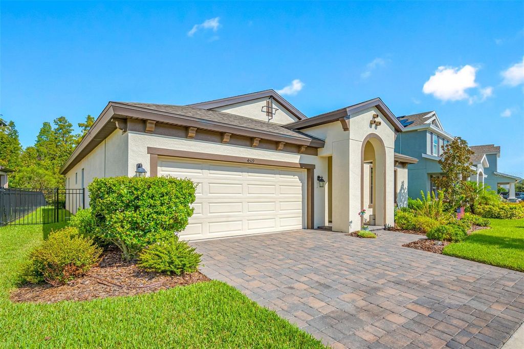 Photo of 4519 Ballantrae Boulevard, Land O Lakes, FL 34638 (MLS # TB8305829)