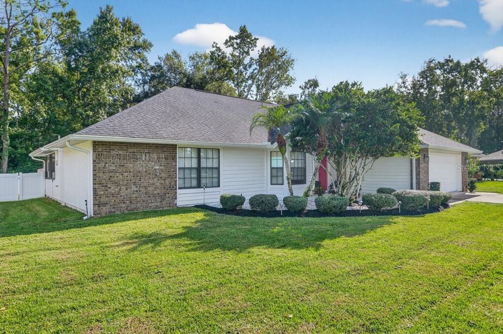 Photo of 1941 Spruce Creek Landing, Port Orange, FL 32128 (MLS # NS1086156)