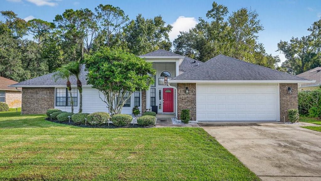 Photo of 1941 Spruce Creek Landing, Port Orange, FL 32128 (MLS # NS1086156)
