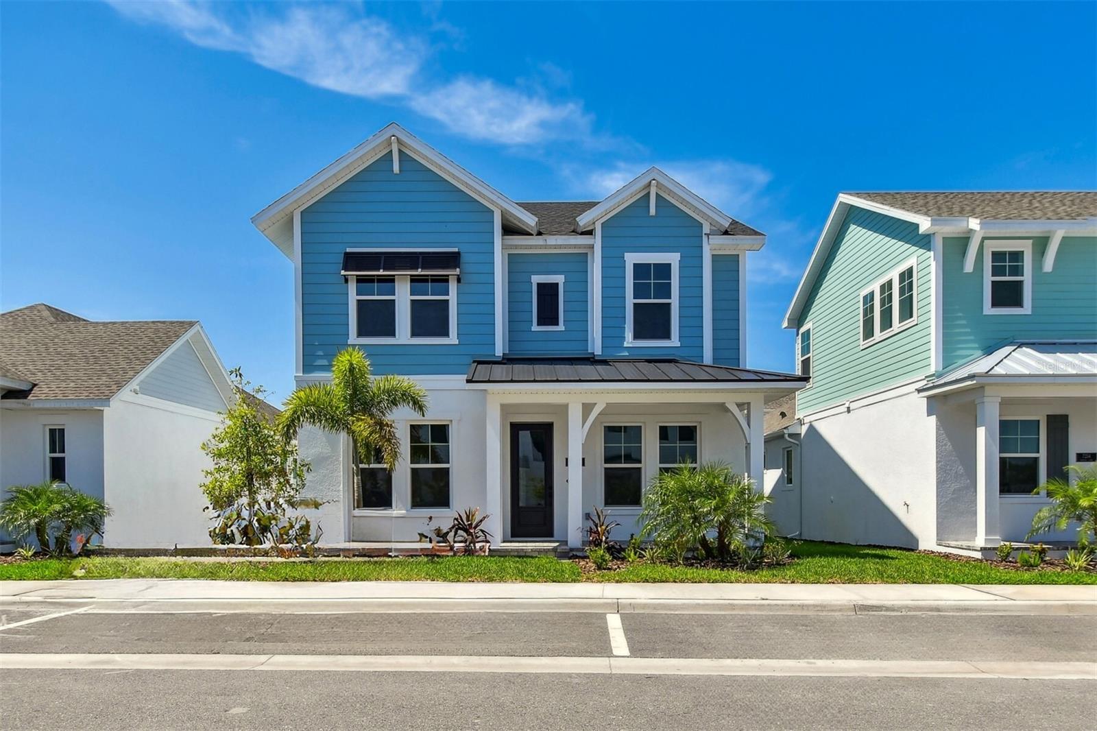 One or more photo(s) has been virtually staged. Under Construction. Introducing the Waterwheel by David Weekley Homes—our largest cottage home in the highly sought-after community of Emerald Landing at Waterside in Lakewood Ranch. This spacious two-story home offers 2,746 square feet of thoughtfully designed living space, featuring 4 bedrooms, 3 full bathrooms, a dedicated home office, and a versatile loft.
At the heart of the home, a gourmet kitchen shines with a designer gas cooktop, under-cabinet hood, built-in microwave and oven, and beautiful finishes. The kitchen flows effortlessly into the open dining and living areas, making it the perfect layout for entertaining or simply enjoying everyday moments with family.
A guest suite with a full bath is conveniently located downstairs, ideal for visiting family or friends. The light-filled study at the front of the home provides a quiet space to work or read. Upstairs, the expansive Owner’s Retreat offers a peaceful escape with an en suite bath and large walk-in closet. You’ll also find a cozy loft—great for a reading nook or homework station—and two oversized secondary bedrooms offering plenty of space to grow.
Enjoy true peace of mind with hurricane-impact windows throughout the home and an HOA that handles exterior maintenance including landscaping, irrigation, and general upkeep—perfect for a carefree lifestyle.
Living in Emerald Landing means enjoying resort-style amenities just steps from your door. The community features a heated pool for year-round enjoyment, a mini clubhouse, pickleball courts, a lakeside firepit, dog park, and a dock with Water Taxi access. You’ll also love the direct sidewalk connection to Waterside Place—only a 10-minute walk to restaurants, shops, weekly events, and the popular Sunday Farmers Market.
Plus, this energy-efficient home includes Energy Saverâ„¢ innovations that provide comfort and long-term savings.
Don’t miss your chance to own this stunning home in one of Lakewood Ranch’s most exciting new communities!
**Purchase a select David Weekley Quick Move-in Home in the Tampa, Manatee and Sarasota area from July 1-31, 2025, qualified buyers may be eligible for mortgage financing at a 4.99% interest rate (5.036% APR for conventional loans, 5.733% APR for FHA and VA loans) mortgage loan. Homes must close by September 1, 2025.