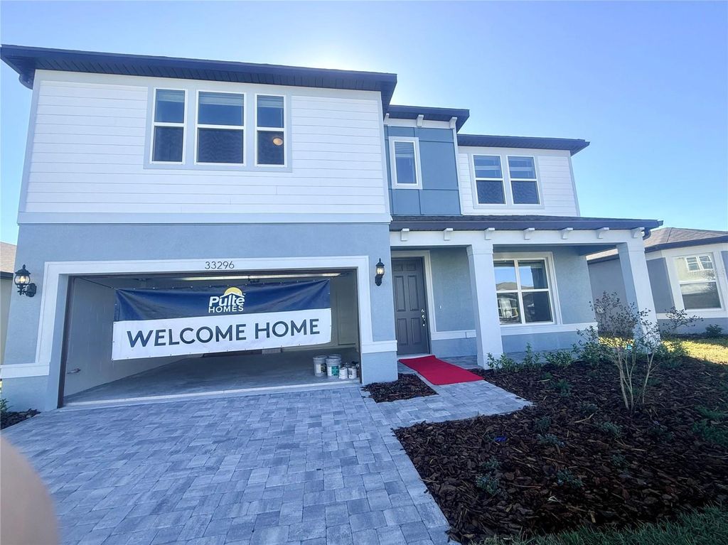 Photo of 33296 Binding Ties Lane, Wesley Chapel, FL 33545 (MLS # J996418)