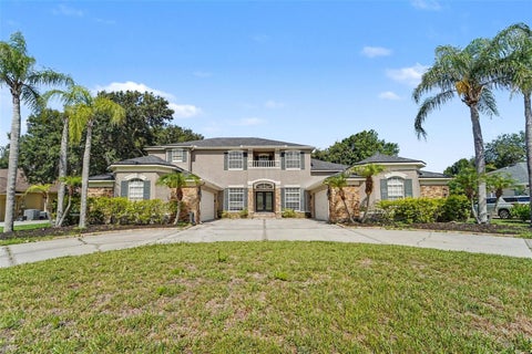 Photo of 7519 Dunbridge Drive, Odessa, FL 33556 (MLS # TB8520976)
