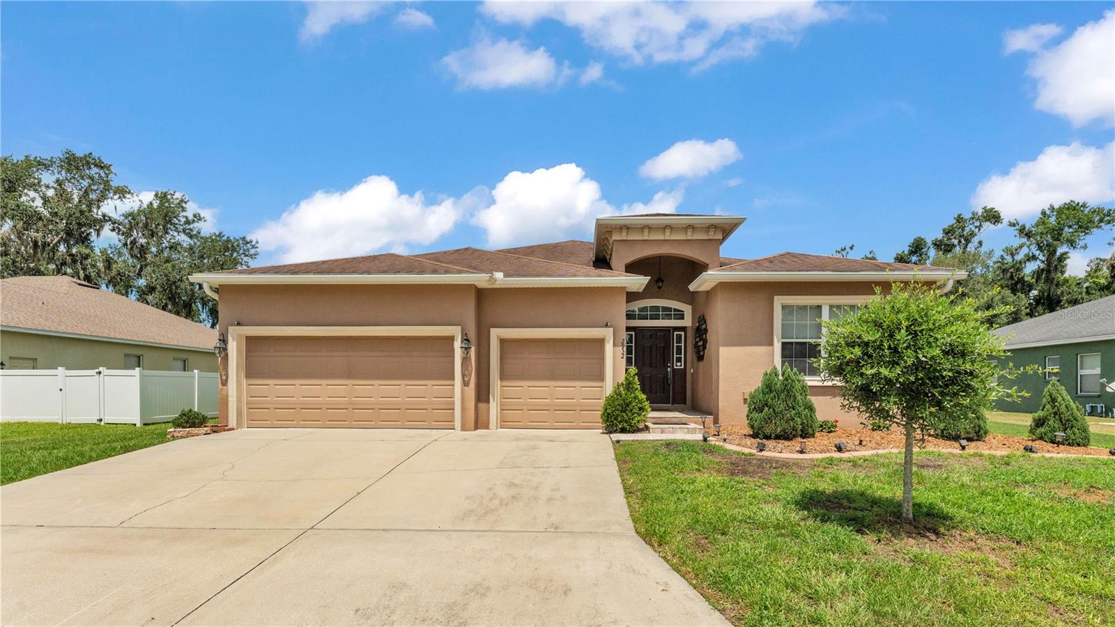 Welcome to this beautifully maintained home located in the desirable Blackwater Oaks neighborhood of Imperial Lakes! This spacious 4-bedroom, 3-bathroom home also features a versatile bonus room perfect for a home office, playroom, or study. The thoughtful split floor plan includes a formal living room, a separate family room with surround sound, and a dining area that opens to the heart of the home—the kitchen. The large kitchen is ideal for entertaining, offering abundant cabinet space, a closet pantry, stainless steel appliances, a water filtration system and generous counter space. The oversized master suite includes a private sitting area, a luxurious bathroom with dual sinks, a walk-in shower, a soaking tub, and a large walk-in closet. Situated on an oversized .33-acre lot that backs up to a peaceful conservation area, the backyard is a true retreat. Enjoy the enlarged screened-in patio with brand-new screens, sealed pavers, and a hot tub—perfect for relaxing or entertaining. There’s even a firepit for cool evenings outdoors. Additional features include 3-car garage with hanging storage shelves, Whole-house surge protector, Extra insulation in the exterior walls (foam) and attic, Large indoor laundry room with plumbing for a utility sink, and large attic space. Don’t miss this opportunity to own a move-in ready home with space, privacy, and thoughtful upgrades in a quiet, well-kept neighborhood!