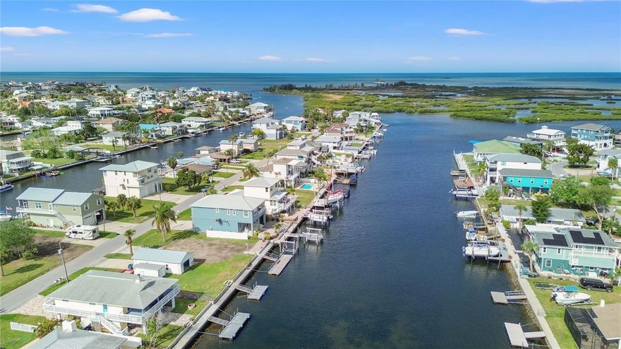 DIRECT GULF ACCESS!!  This prime waterfront lot in beautiful Hernando Beach, Florida, offers a rare opportunity to build your dream home in a boater's paradise. With direct Gulf access, you can enjoy fishing, boating, and stunning water views right from your backyard. The property includes a full seawall and knee wall for added stability, along with a 16-foot dock for your vessel.  The brackish water provides a unique array of fish and water life for the passive viewer or the shoreline fisher.  Additionally, a spacious 16-by-32-foot garage is already in place, perfect for storage or a workshop.

Once your home is built, you'll be treated to breathtaking views of the serene canal and surrounding mangroves. Even better, there is an adjacent property available, offering a unique opportunity to expand your waterfront living space or invest in additional land.   More good news, the impact fees are already paid for this lot!

Don't miss your chance to own a slice of Florida’s coastal paradise. Contact today for more details or to schedule a viewing!
