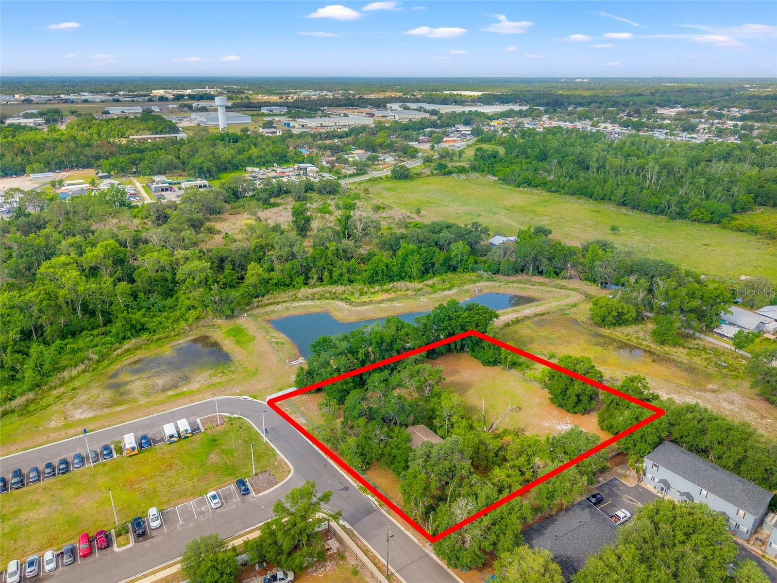 Investor/Developer Opportunity – 1 Acre Zoned R-1A/R-12 in Plant City! This full acre offers outstanding residential development potential, with zoning that may allow up to 10 townhome units (buyer to verify). The existing structure holds no contributory value but could be repurposed as a temporary office or cleared for new construction. Located in Flood Zone X with nearby utilities and no HOA, the property is flat, usable, and well-suited for infill housing, build-to-rent, or townhome projects. Conveniently positioned just minutes from I-4, downtown Plant City, shopping, and dining, this is a rare opportunity to build in a high-growth market. Bring your plans and take advantage of the upside potential! Price BELOW Appraisal!!!!