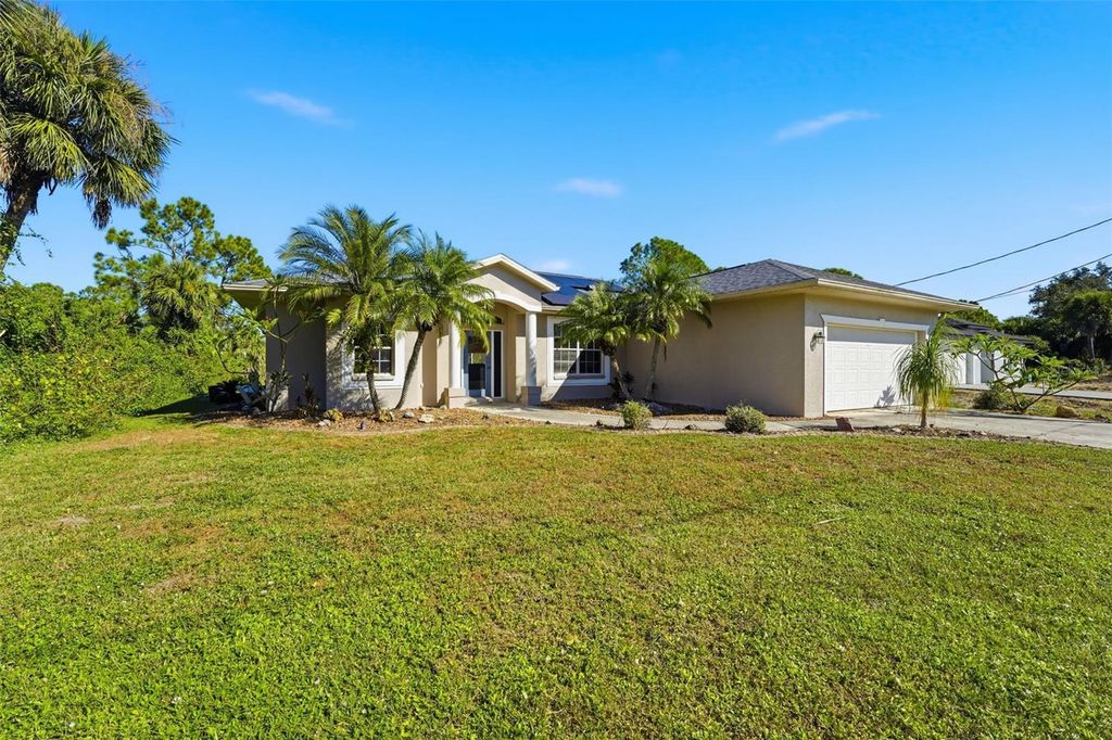 Photo of 1956 Snover Avenue, North Port, FL 34286 (MLS # A4668367)