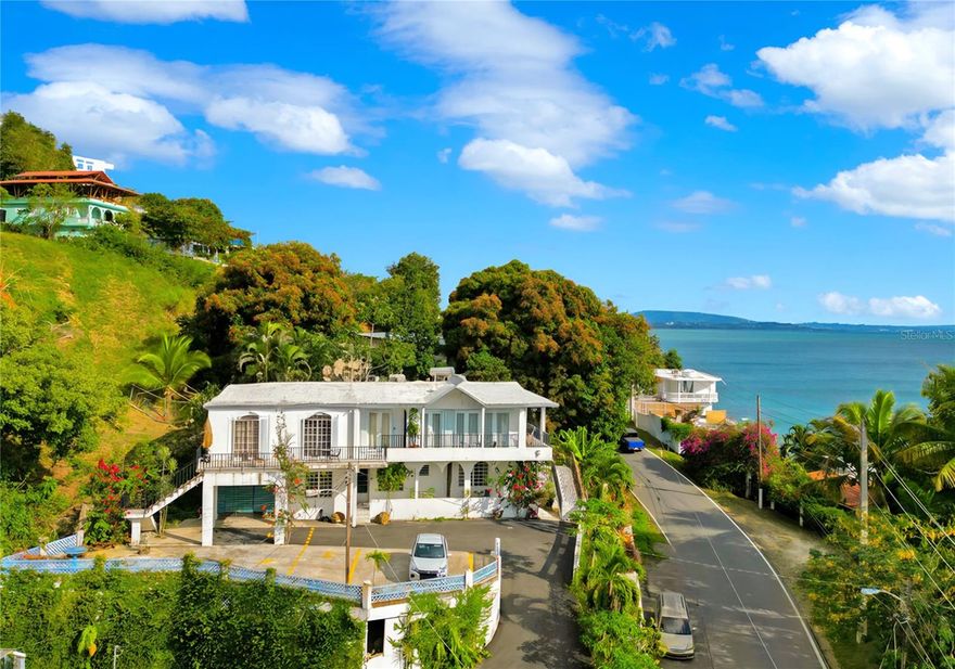 Exceptional multi-unit property featuring four spacious units plus a detached studio totaling five income-producing units.  There is even space for a sixth unit with a little TLC.  Ideally perched on the hill across the street from the sea, this property boasts beautiful ocean views, unique architectural details and lush, well-maintained landscaping.

Each unit offers generous layouts and is ready to go, making this an ideal turnkey investment or value-add opportunity. The property is well equipped with a generator, cistern, and ample storage throughout, ensuring convenience and reliability.

With its prime coastal location, flexible configuration, and endless possibilities, this is a rare chance to own a versatile seaside asset with strong upside potential.

Qualified buyers call for a viewing today!