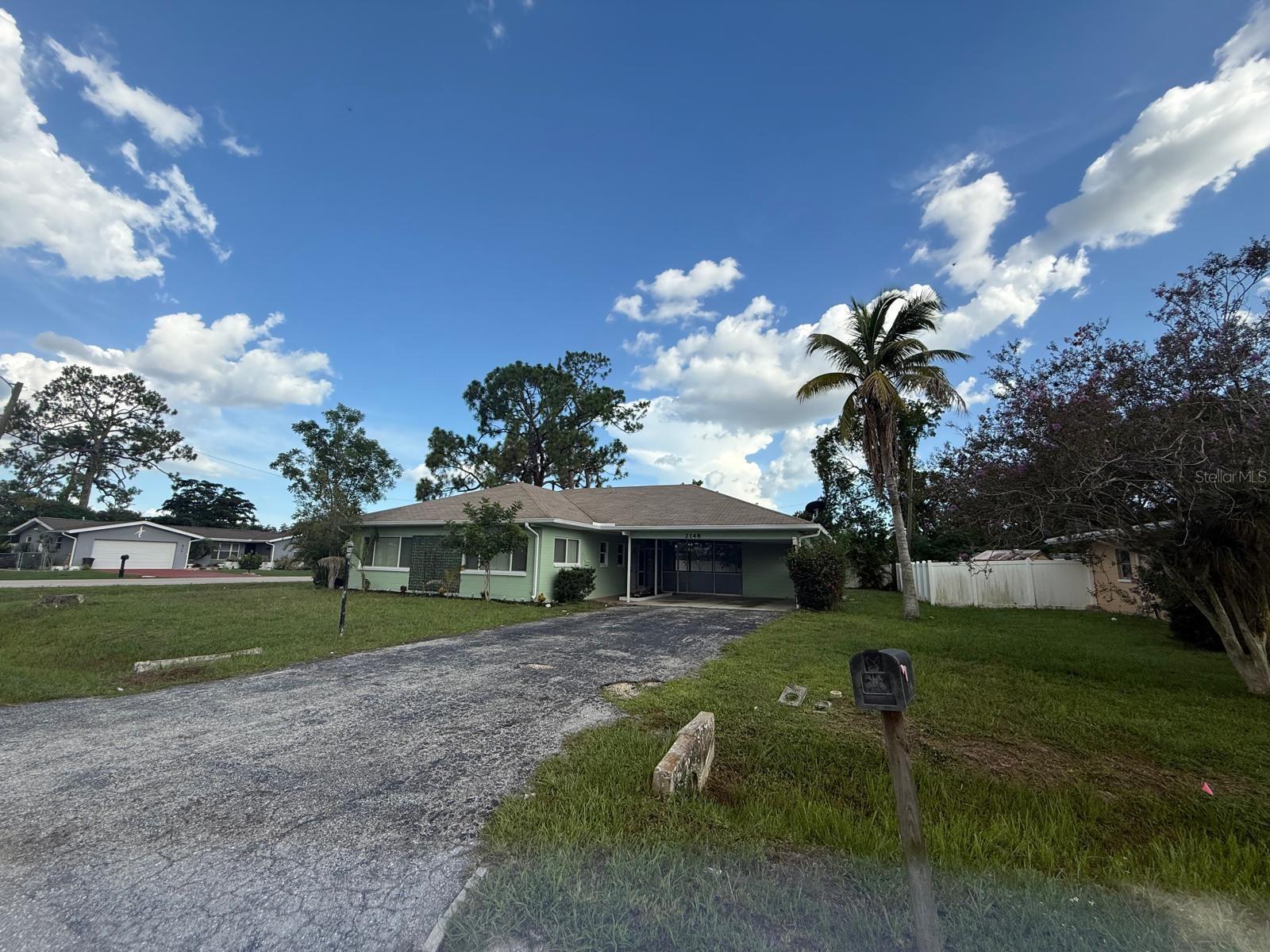 Fully Renovated Gem in Fort Myers Location – Less than 30 Mins from the Beach! Step into modern comfort in this beautifully renovated home featuring European-style cabinets and appliances, an ample living room, and a dedicated dining area off the kitchen. Enjoy outdoor living on the screened porch—perfect for gatherings— while still having the cars under the carport! This home was made for nature lovers, featuring endemic plants, and an oversized backyard that's waiting for your gardening creativity. Major updates include state-of-the-art bathrooms, stunning kitchen, a partially replaced roof, and sleek laminate flooring throughout. Separate laundry room comes ready with washer and dryer. Conveniently located near the golf and yacht clubs, top-rated schools, shopping, dining, and more. Don’t miss this move-in-ready masterpiece!