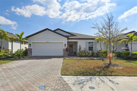 Photo of 5406 Patano Loop, Palmetto, FL 34221 (MLS # O6362987)