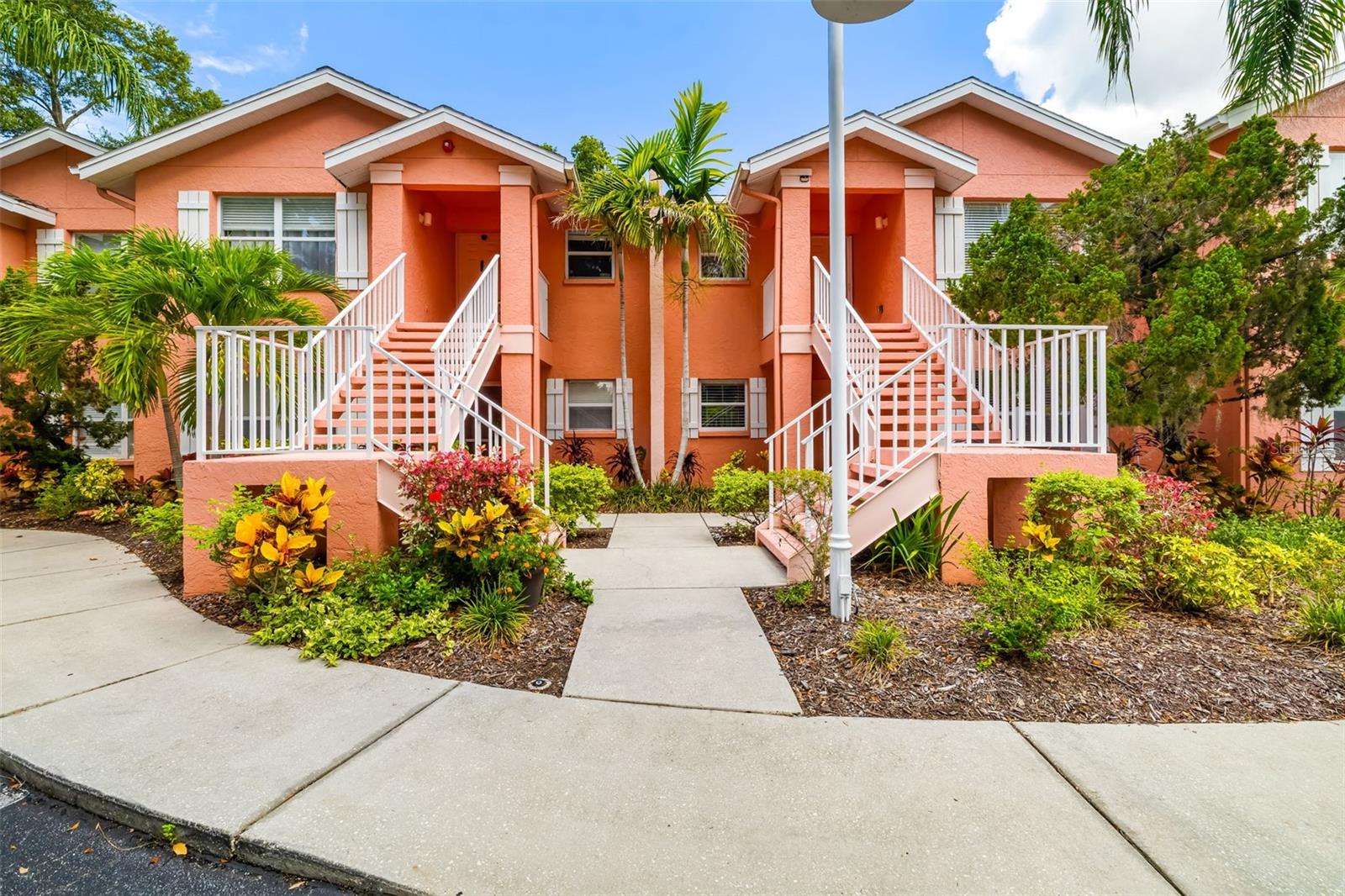 Discover a blend of tranquility, comfort and convenience in this beautifully updated and rarely available first-floor condominium in the meticulously maintained Longwood Run community. Overlooking a lush, private park-like setting, this two-bedroom, two-bath residence offers a serene escape with thoughtful upgrades throughout—and furniture is included, making it move-in ready. Plus, you’ll appreciate the assigned parking space and guest parking just steps from your front door. Step inside to an inviting open floor plan where the spacious great room and dining area flow effortlessly together, illuminated by recessed LED lighting. The screened lanai features tile flooring and new screening, providing a peaceful spot to relax and enjoy the surrounding greenery and is accessible from the living area and the primary bedroom. The updated kitchen is a delight, featuring granite countertops, a stylish tile backsplash, shaker-style soft-close cabinetry with pullout shelves and updated hardware, stainless steel appliances including a new smooth-surface range and microwave, and a breakfast bar that overlooks the great room, ideal for entertaining. The primary suite is a private retreat, boasting lanai access, a generous walk-in closet, and an en-suite bath with a tiled walk-in shower and granite-topped vanity. A second updated bath with tub/shower combo and granite finishes serves guests or the second bedroom. Additional improvements include waterproof luxury vinyl plank flooring throughout—including bathrooms, 5½-inch baseboards, comfort-height toilets, interior laundry closet with a full-size GE washer and dryer, ceiling fans, recently painted interior and air conditioner (2021). Magnolia Place is a charming community of just 16 residences offering a quiet, walkable neighborhood. Enjoy being only 2.5 miles from University Town Center, Interstate 75, shopping, dining and all the conveniences of Sarasota—plus less than 15 minutes from Sarasota Bradenton International Airport, downtown Sarasota and scenic Sarasota Bay waterfront. Outdoor lovers will appreciate Longwood Park—just .4 miles away—with dog-friendly amenities, tennis, pickleball, basketball courts, a playground, gymnasium and more. This lovingly maintained gem won’t last long. Schedule your private tour today and experience Sarasota living at its finest!