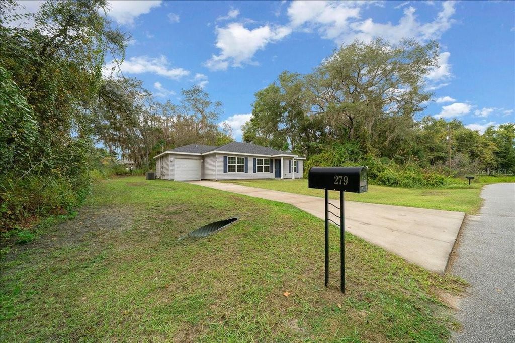 Photo of 279 Oak Lane Track, Ocala, FL 34472 (MLS # OM712557)