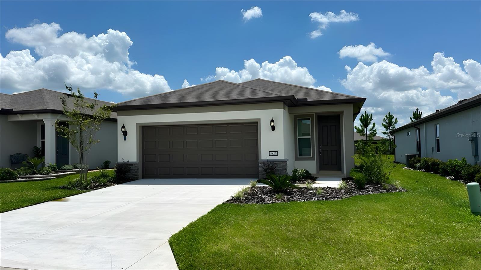 BRAND NEW HOME 2025 NEVER OCCUPIED! This gorgeous Hallmark Model is MOVE IN READY! One year top to bottom warranty in effect. Yard is maintenance free, you don't have to do the work. One of the most popular floor plans, very spacious with beautiful design. A screened in lanai with large back yard which you can fence for your fur baby. Â This Del Webb Stone Creek community has swimming pools, golf course, many activities, amenities and on property restaurant! This is a golf cart community where you can ride outside the community to three different plazas which include grocery stores, medical care, and more restaurants. Don't miss out! There will be no more 2025 Hallmark models available until next year!