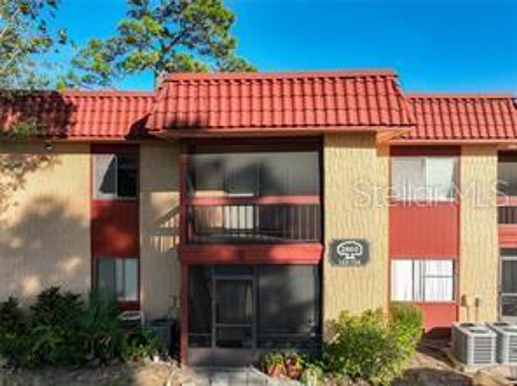 Photo of 2860 N Powers Drive #10, Orlando, FL 32818 (MLS # O6378445)