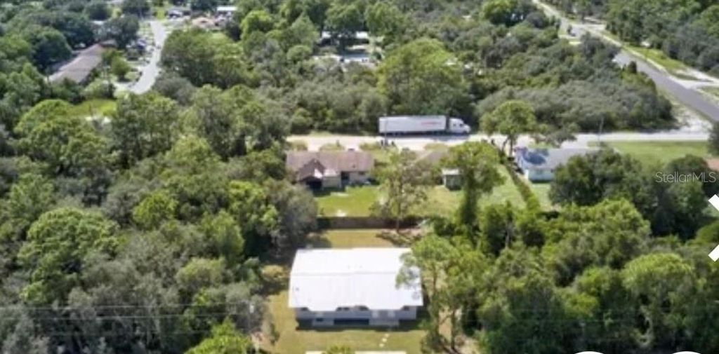 Photo of 115 Glenn Avenue NW, Lake Placid, FL 33852 (MLS # L4957900)