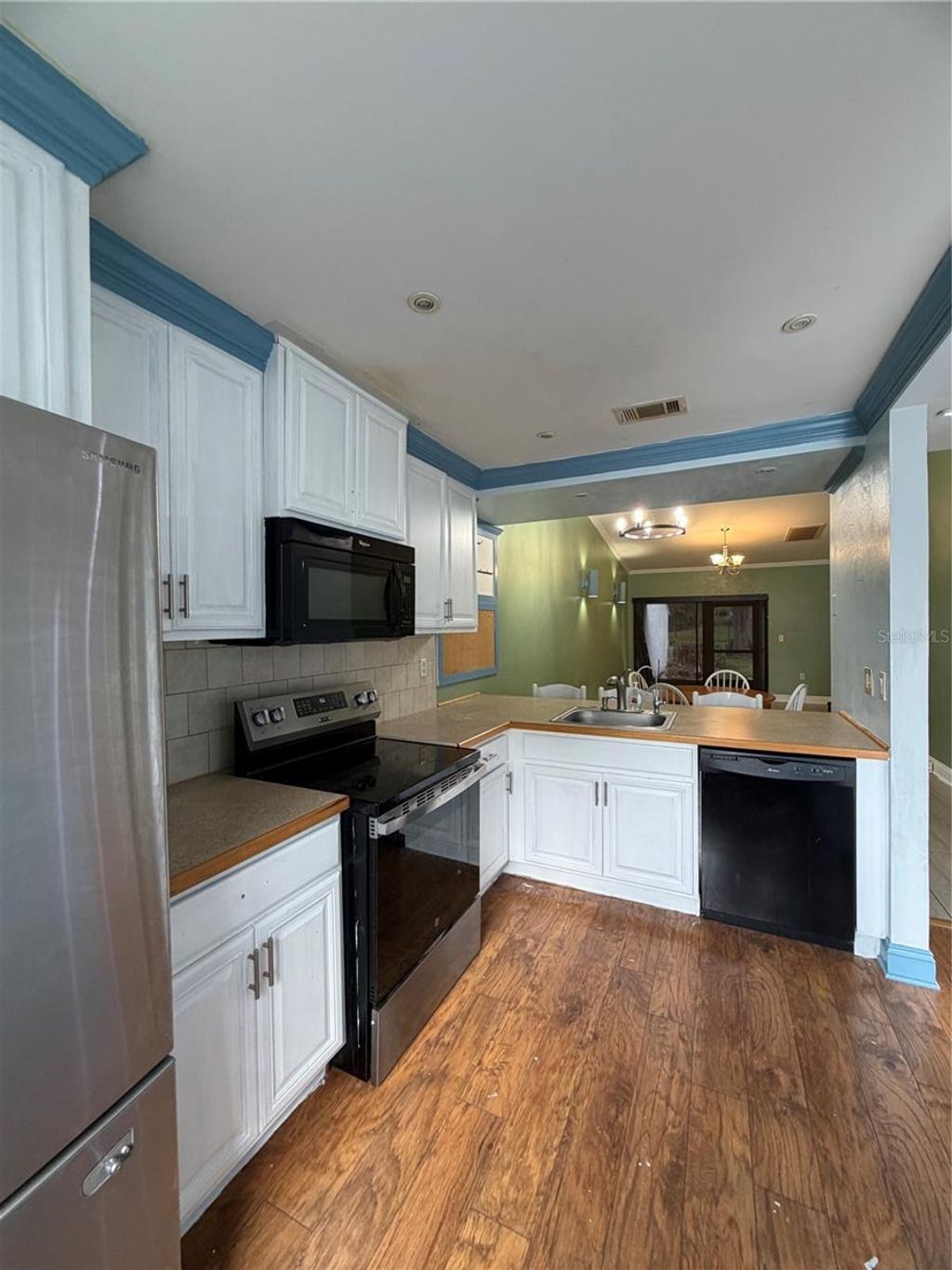 Photo of 441 Prestwick Place, Kissimmee, FL 34759 (MLS # O6396306)